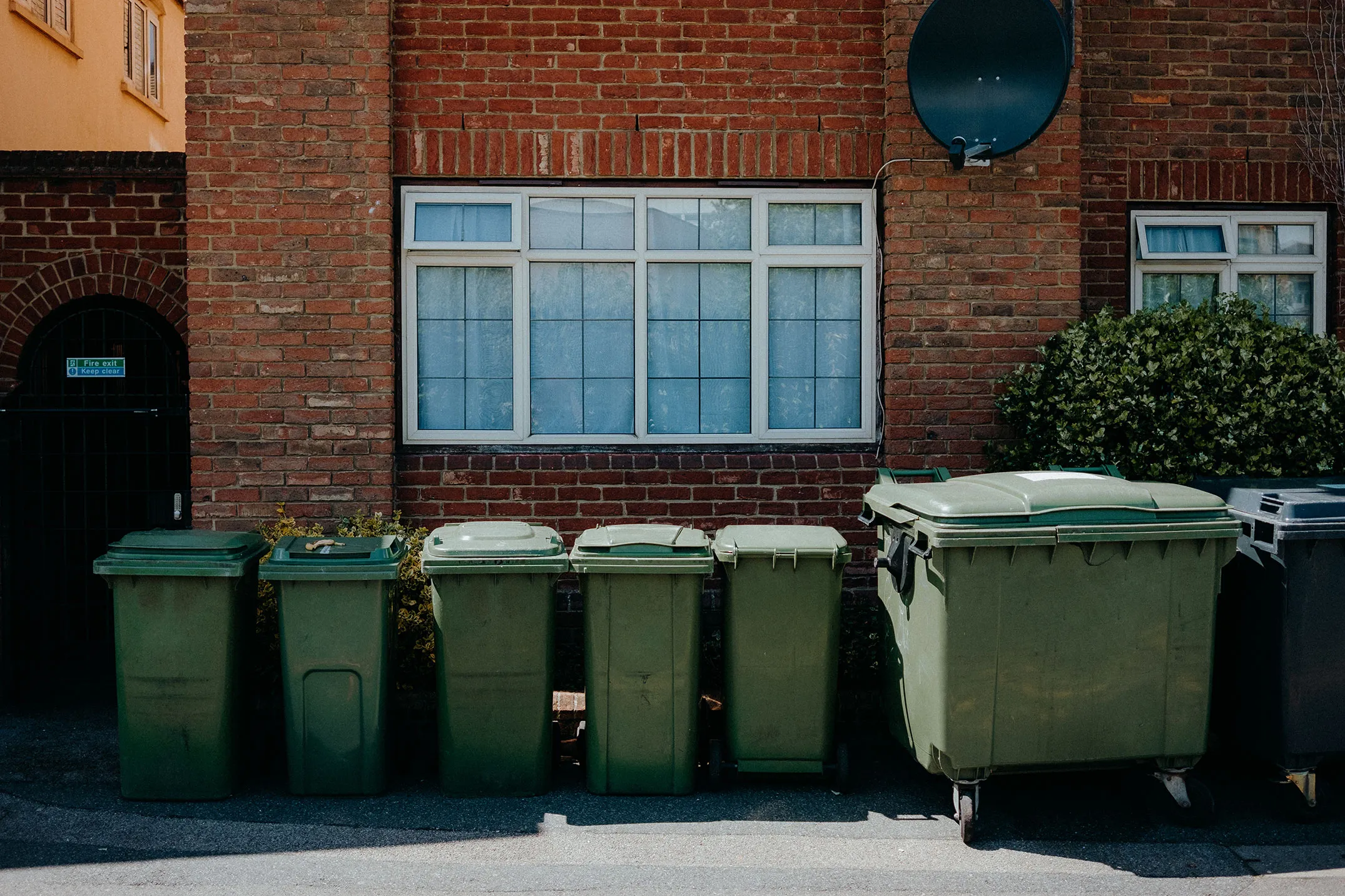 Seven Rubbish Bins outside house in UK